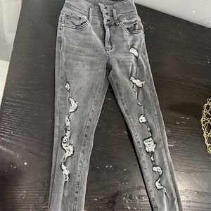 High waisted distressed ripped jeans